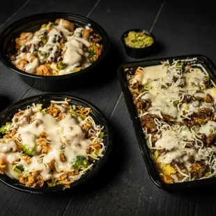 two pans of enchilada casserole