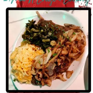 a plate of turkey wings with rice and greens
