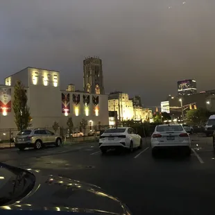 Nighttime view of the theater from parking lot