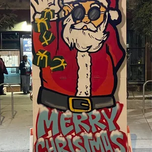 a santa clause on a sign