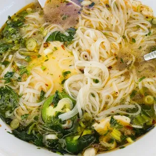 Chicken Pho - I added basil, jalapeños, oil chili, and lemons. Pho already come with green onion, onion, and crispy garlic garnish on top.