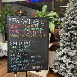 a chalkboard sign in a restaurant