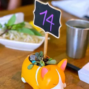 a corgi planter on a table