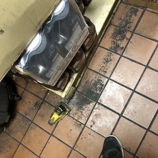 a person standing under a box