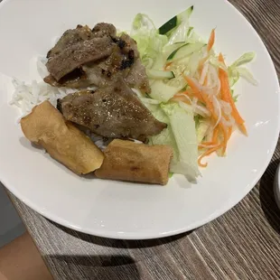 $15 for a bowl of vermicelli, bagged salad, 1 egg roll and 4 small pieces of meat
