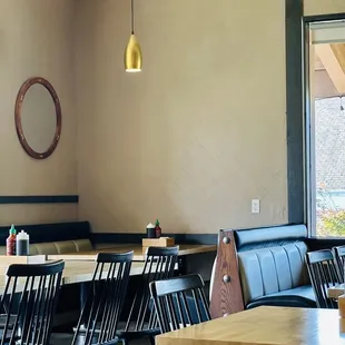 Corner booth has wall outlet, ideal for plugging in your laptop  and having a working lunch or dinner