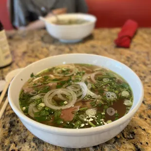 a bowl of soup on a table