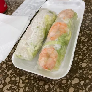 Spring rolls one with pork only and the other with shrimp and pork