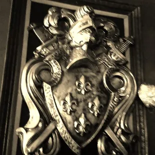 a coat of arms on a wall