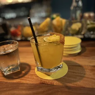 a glass of lemonade and a glass of water