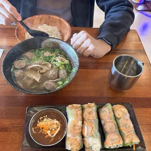 Pho with slices of beef and meatballs, Grilled shrimp spring rolls