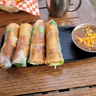 Fried egg roll wrapped in spring roll + delicious sauce