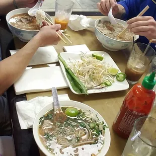 Top two bowls are the special, bottom bowl is chicken pho.