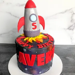 Custom outer space airbrushed rocket cake