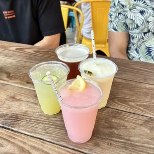 Strawberry water ice, Piña colada, Beer and Cucumber Cooler (anti-clockwise)