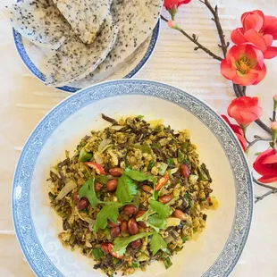 a plate of rice and vegetables