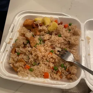 rice and vegetables in a styrofoam container
