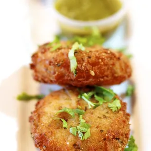 Aloo Tikki - Fried potato cakes served with sweet and spicy chutney