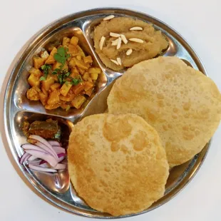 Aloo Puri w/ Halwa - Fried whole wheat bread served with potato curry and sweet lentil pudding.