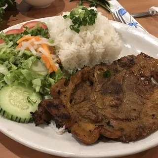 390676. Char - Grilled Pork Chop With Steamed Rice