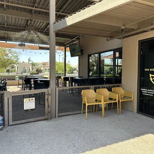 The outdoor dining area on this side may be more in the shade, but all of the action is along the back