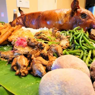 Whole Lechon Baboy kamayan style buffet. Please call 602 410-8115 or email Brian@phxlechonroasters.com for more info.