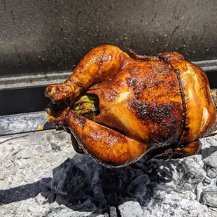 Lechon Manok- Rotisserie Chicken Roasted Over All Natural Lump Charcoal