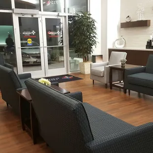 Calming waiting room complete with complimentary beverages.