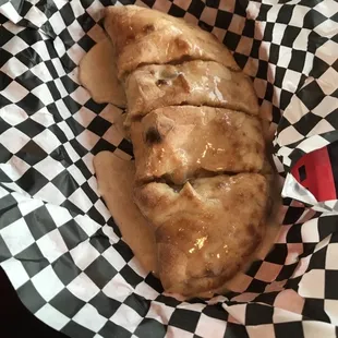 Apple Pi-melted cinnamon glaze, dough filled with cinnamon glazed apples.