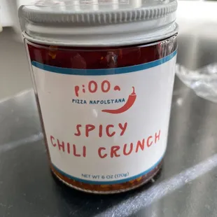 a jar of spicy chili crunch
