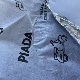 a sandwich wrapped in foil