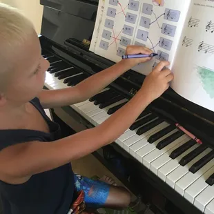 Clayton 4 years old, AND he already knows how to read music! :)