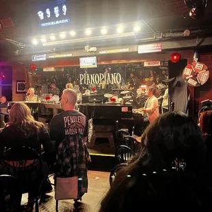 a group of people in a bar