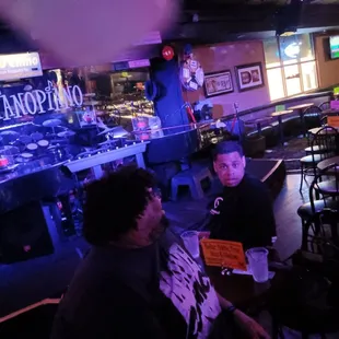 Two birthday men about to place an order before the show begins!