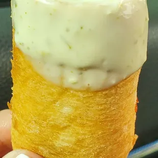 Tequeño with garlic sauce