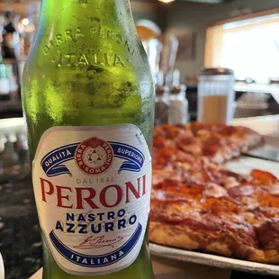 a bottle of peroni