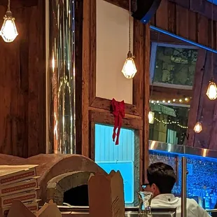 Manning the wood fired pizza oven