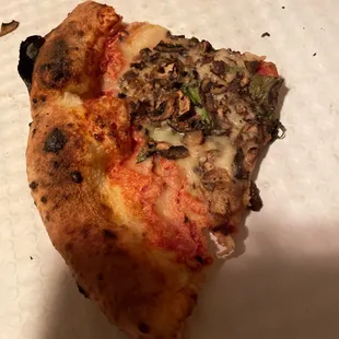 Mushroom pizza after we took it home and finished cooking it.