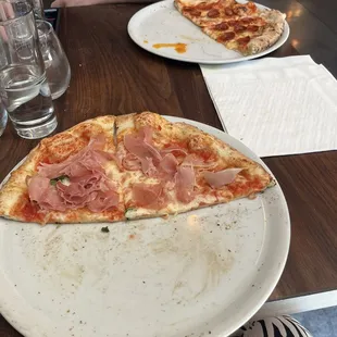 Half of a pepperoni and half of a margarita speck