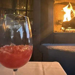 Sangria and a fire place.