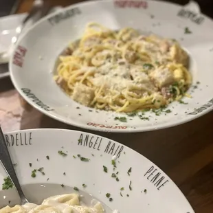 Spaghetti Alla Carbonara (back), Fettucine Alfredo with chicken (front)