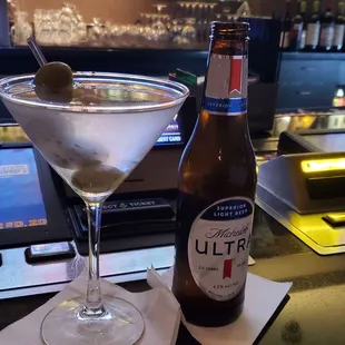 a martini and a bottle of lifer