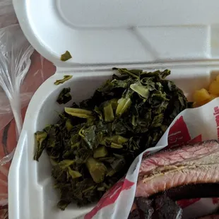 a meal in a styrofoam container