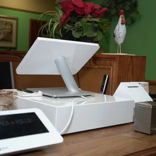 a tablet and tabletop on a table