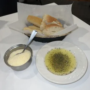 Bread Basket with Parmesan Cheese and Seasoned Olive Oil