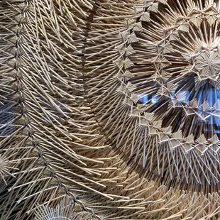Detail of straw art in dining room