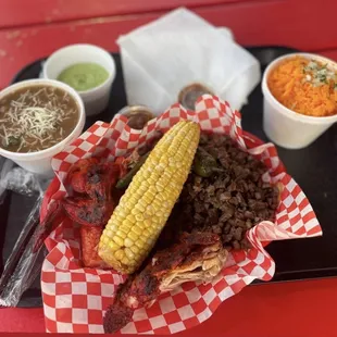 a plate of food on a red table