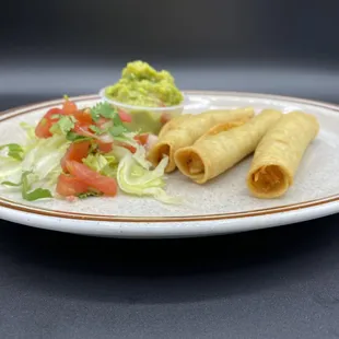 Taquitos. They come is sets of 4. Chicken, beef, or potato inside.