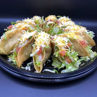 Crispy Tacos by dozen. Available in Chicken, Beef, or Potato.