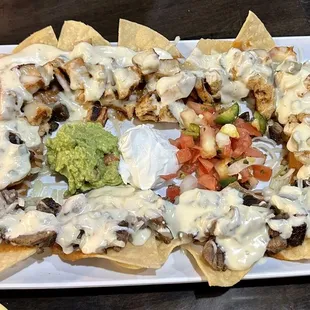 NACHOS!   Beef and chicken.  So delicious!